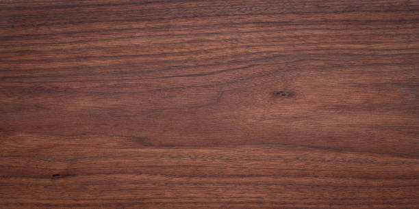istock Walnut wood texture. Super long walnut planks texture background.Texture element. wood texture background. 2195193310