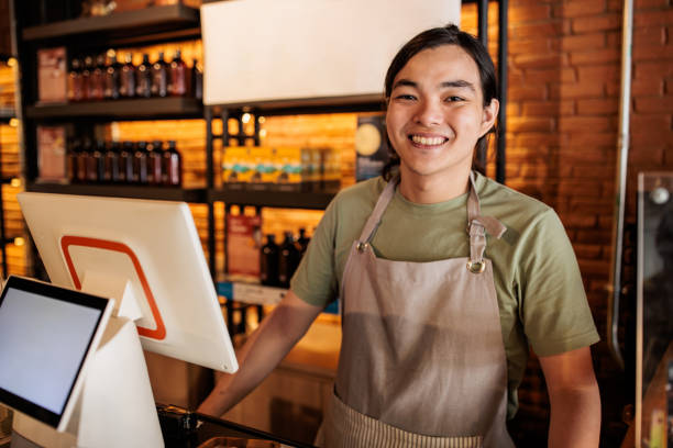 istock Charming Young Barista at the Cafe 2195193409