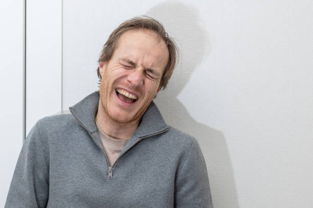 Joyful Professional Laughing with Expression of Pure Happiness in Knokke-Heist, Flanders, Belgium