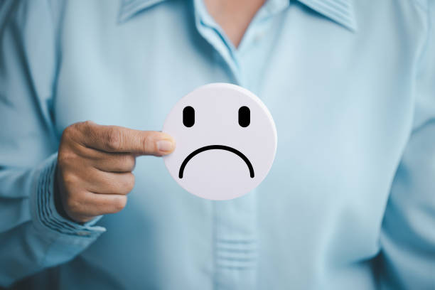 istock Concept good business includes handling both compliments complaints from customers ensuring employee satisfaction addressing negative feedback to prevent mental strain customer dislike with sad face 2195198201
