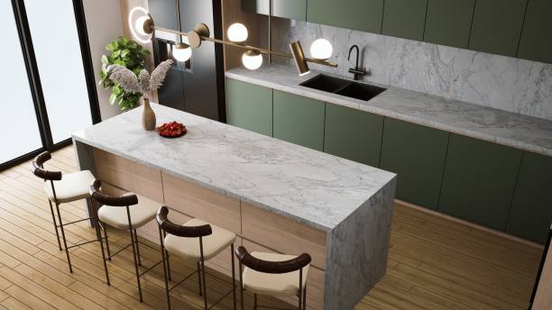 istock A modern kitchen featuring a large marble island, stylish seating, green cabinetry, and contemporary lighting. 3d rendering dining top view. 2195198302