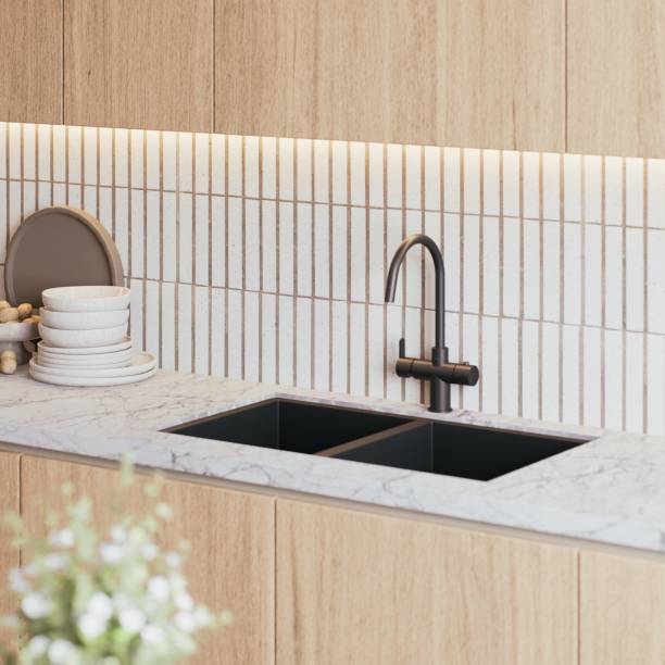 istock A modern kitchen sink with a sleek faucet, featuring a minimalist design and stylish tile backsplash, complemented by wooden cabinetry. 3d rendering. 2195198384