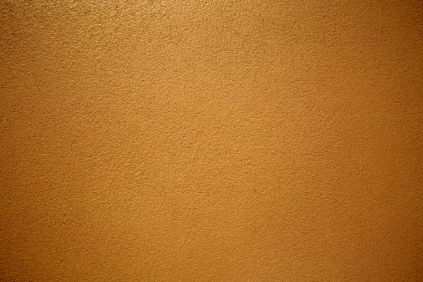 istock Blank raw old Cement, Concrete Wall or Polished plaster wall with Orange color for Texture and Background. 2195200744