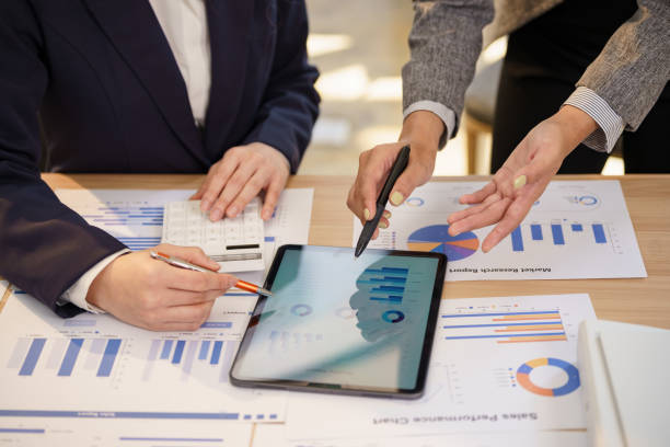 istock Working with business report documents on the office desk requires young business teamwork. Brainstorming Business People Design Planning, Brainstorming Planning Partnership. 2195202337