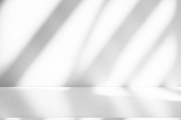 istock Wall interior background, studio and backdrops show products.with shadow from window color white . background for text insertion and presentation product 2195203118