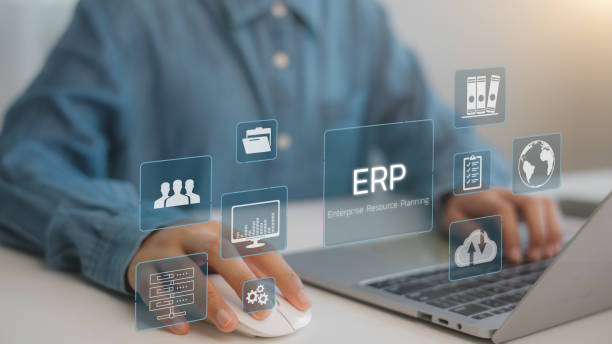 istock ERP enterprise resource and planning concept. Businessmen use laptops to document management and analyze ERP systems on virtual screens. Connections between business intelligence. 2195207744