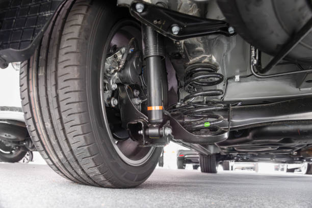 istock MPV car suspension and rear drive shaft. 2195209479