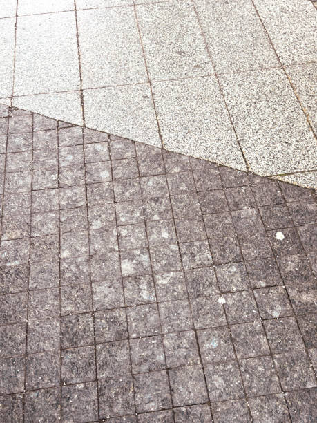 istock A gray and white tile floor with a black and white tile border 2195210593