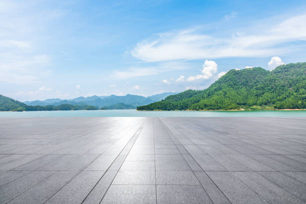 istock Empty square floor and lake with mountain nature landscape in summer 2195213319