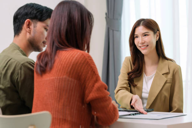 istock asian financial advisor presenting charts and data on a tablet during couple client meeting.financial planning and decision-making 2195216704