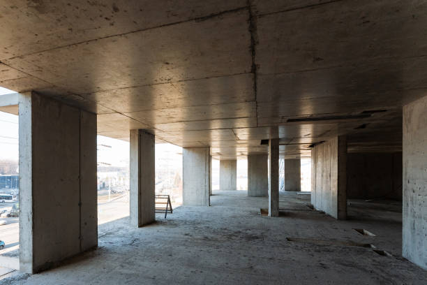 istock A currently vacant structure is presently under construction, showcasing robust concrete walls and durable pillars that clearly define the framework of the future space that will emerge 2195217930