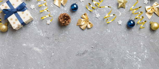 istock New Year composition. Christmas decor background with pine cones. Top view with copy space 2195222822