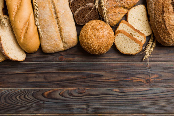 istock Homemade natural breads. Different kinds of fresh bread as background, top view with copy space 2195222844