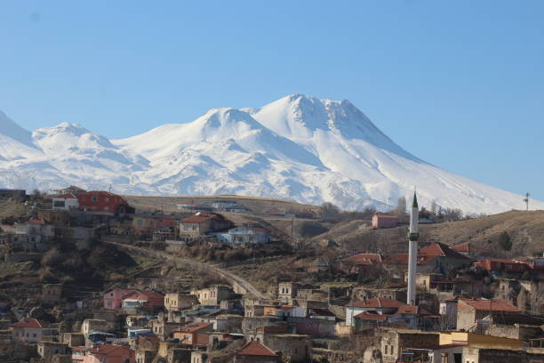 istock Village and Stratovolcano 2195224215