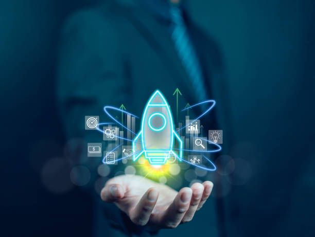 istock Businessman touching transparent rocket icon launching. Startup concept, rocket, growth, company, idea, success, digital, technology, marketing, finance, innovation, project, design, creativity. 2195224978