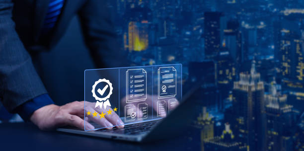 istock Businessman holding quality certification mark, audit, business, assurance, control, digital, service, complete, assessment, checklist, data with quality icon. 2195225199