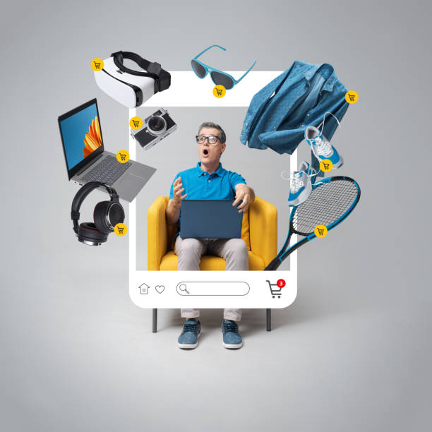 istock Cheerful man doing online shopping 2195230246