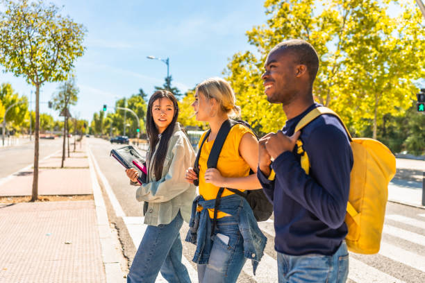 istock Multi-ethnic students on the way to the university 2195230981