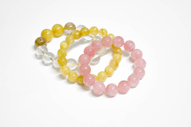 istock Crystal gemstones bracelet beads collection on white background. 2195231123