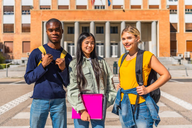 istock Portrait of three multi-ethnic students at the campus 2195231138