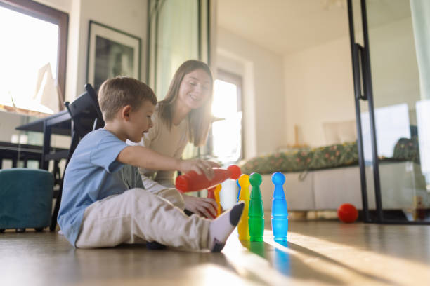 istock Mom and son playing together 2195233082