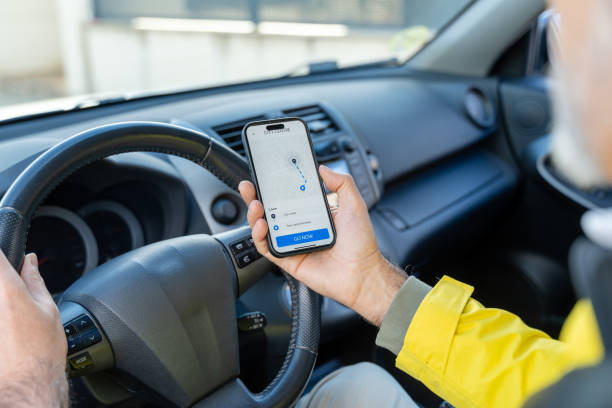 Driver Using. Map 2,900+ Driver Holding Map Stock Photos, Pictures & Royalty-Free Images ...