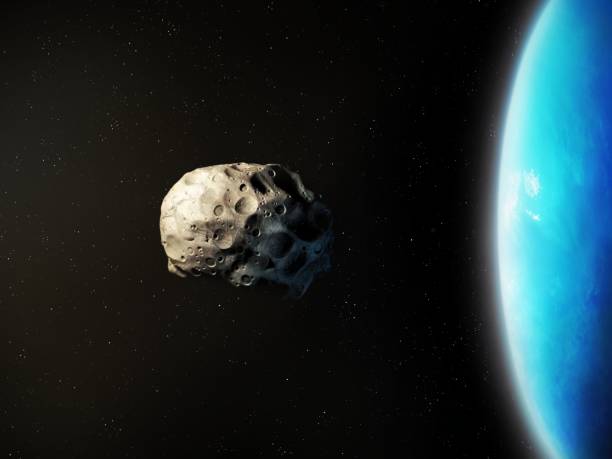 istock Asteroid near a planet. A rocky satellite orbiting a planet. 2195235160