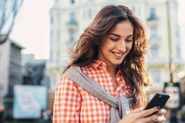 istock Texting in the city 2195235551