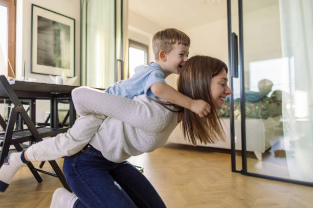 istock Mom and son playing together 2195235872