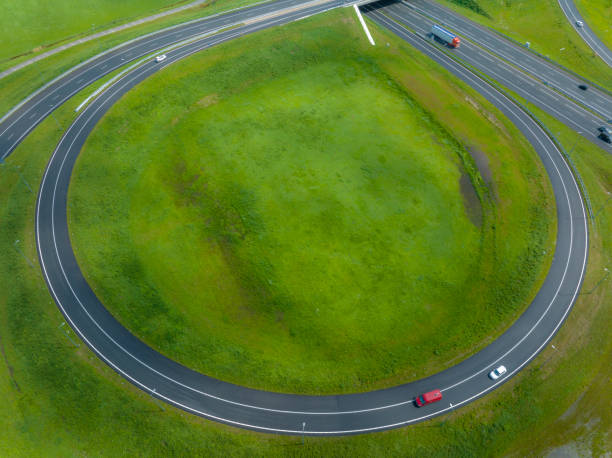 istock Traffic on a highway junction seen from above 2195238453