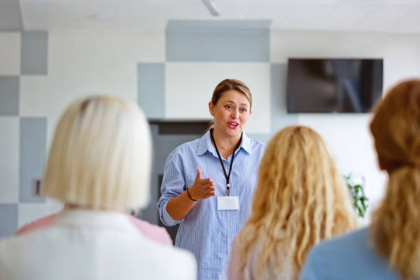 istock Mature businesswoman giving presentation 2195245565
