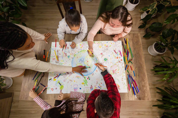 istock Creative Earth Day Activity with Teacher and Kids 2195247055