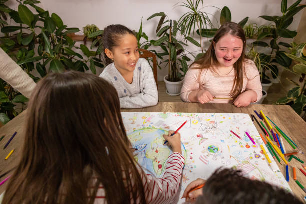 istock Happy Kids Designing an Earth Day Poster 2195247362
