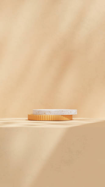 istock Empty scene featuring product display stands along with a podium, set against a orange background with soft, subtle shadows in a portrait orientation 2195249357