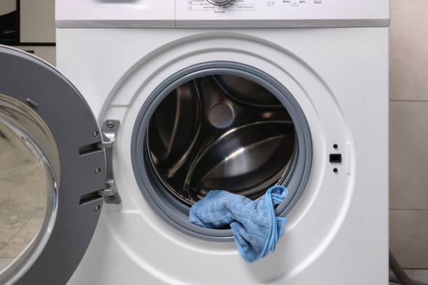 istock Special cloth for wiping moisture from the washing machine. Preventing mold formation. 2195249373
