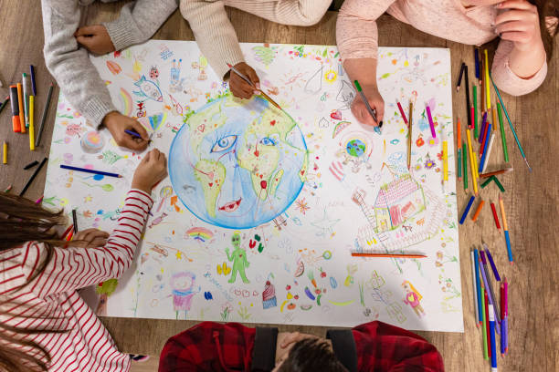istock Teacher and Students Color for Earth Day 2195249884