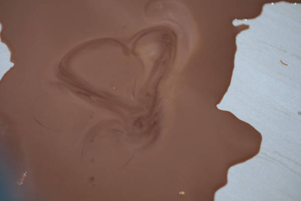 chocolate drink spilled onto the floor, love shaped