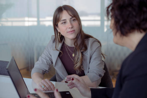 istock Female financial advisor with female client 2195251071