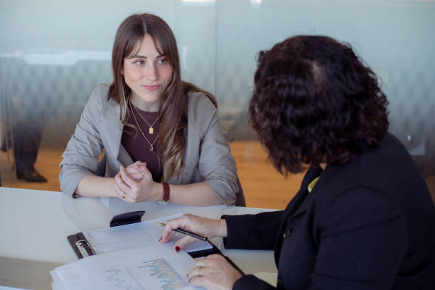 istock Female financial advisor with female client 2195251106