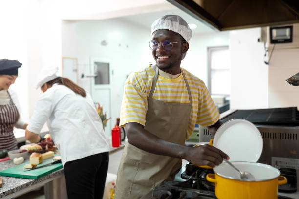 Portrait of chef and students