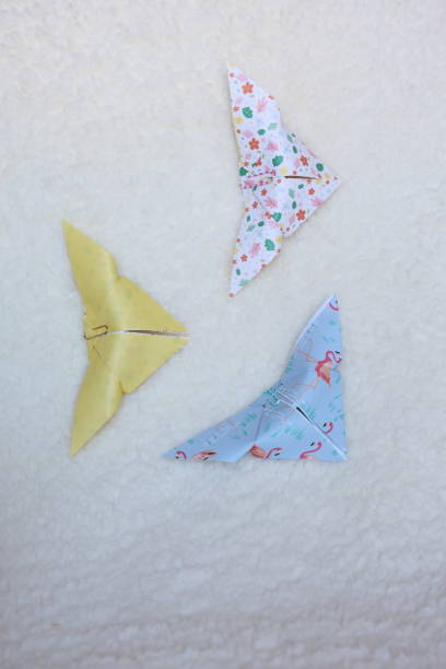 3 paper butterflies are displayed