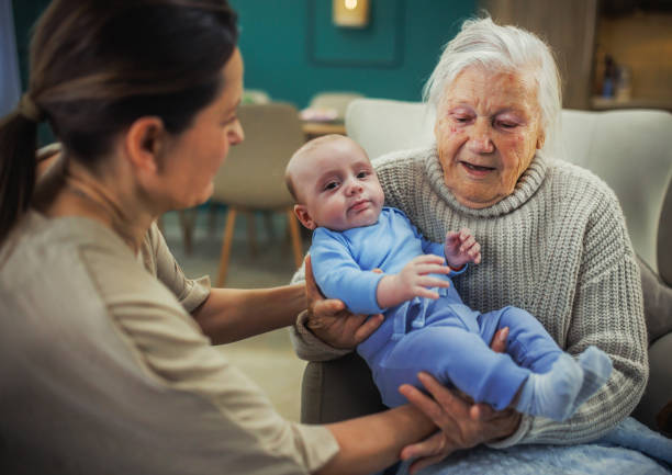 istock Happy family of three generations on sofa 2195259292