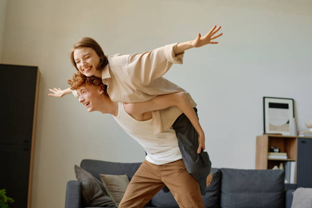 istock Couple Fooling Around at Home 2195263962