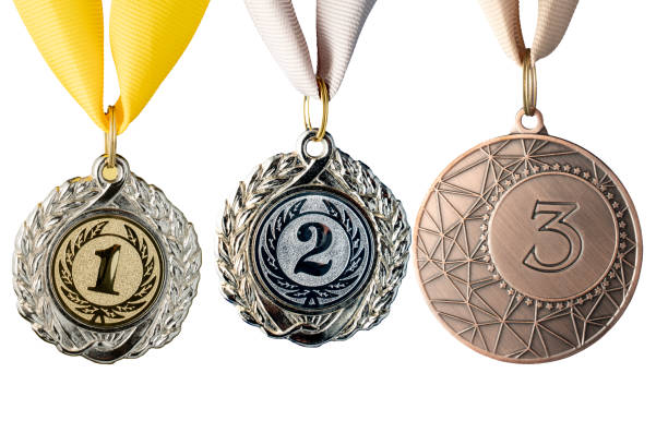 istock Three medals are shown, one of which has the number 1 on it 2195266508