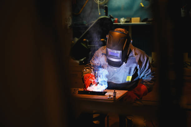 Process of welding with sparks and smoke