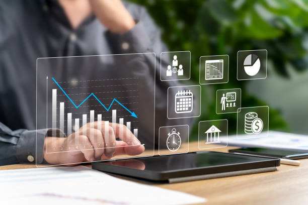 istock Cost planning, Financial management, work target, Businessman making graphs and analyzing planning for the budget of the company, Training, Meetings, Developing quality of product, Cost reduction 2195269843