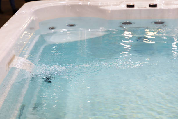 istock cascading high pressure clear water jet in individual bath . 2195282173