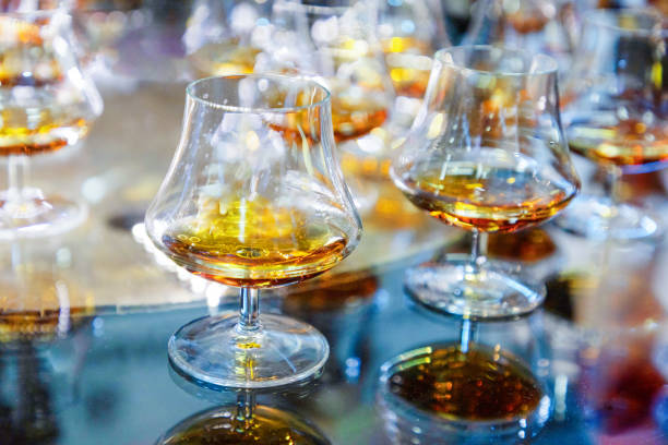 istock many glasses with strong alcohol stand on the table ready to drink 2195282474