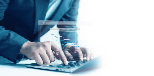 istock managing milestones on a timeline Gantt chart in technology online. concept of project planner in software, schedule plan management work update, and workflow. project, business,  plan, schedule, 2195282824