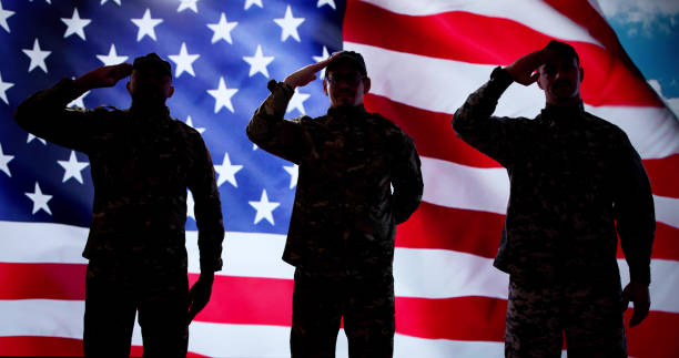istock African American Soldier Saluting Flag 2195283725